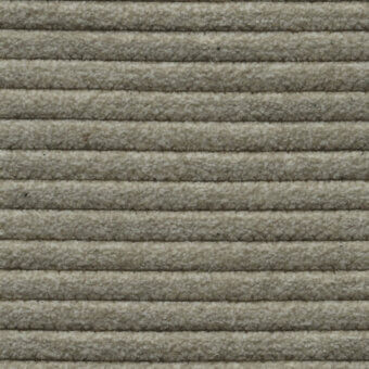 Ribbed upholstery fabric in gray-beige tones displays horizontal linear texture, with a matte finish and “harlem 100” label visible.