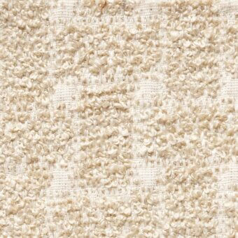 Beige woven fabric texture with looped fibers, displaying a subtle parallel pattern and matte finish; labeled “cierre1972 parallel 070”.