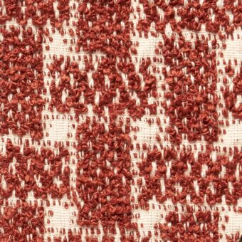 Woven fabric texture, rust-orange and off-white geometric diamonds, dense parallel weave, tactile nubby yarns, Cierre1972 Parallel 074.