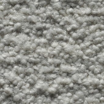 Smilla stretch fabric, muted gray looped pile, irregular texture with varying loop heights, Cierre1972 collection sample.