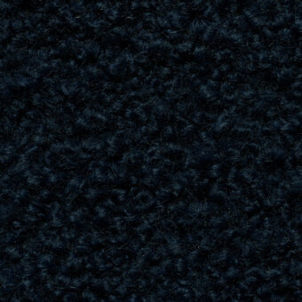 Navy blue looped pile fabric texture with a dense, nubby surface and subtle tonal variations, displaying a compressed, three-dimensional structure.