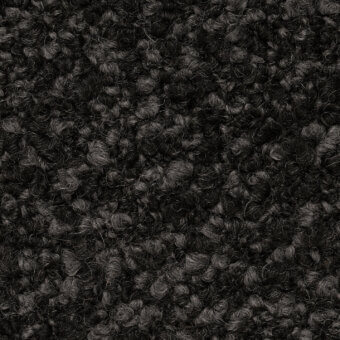 Charcoal gray vellus fabric with a dense, looped pile texture and mottled tonal variations, showcasing a soft, plush, slightly matted finish.