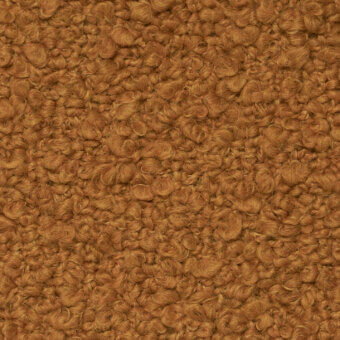 Vellus fabric sample, golden-brown looped pile, dense texture with uniform density and subtle height variation, tactile and plush appearance.