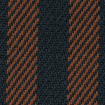Woven textile sample, "Voulez Vous" collection, features diagonal stripes in dark gray-blue and rusty brown with a dense, subtly textured weave.