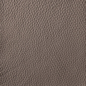 Cougar 97 leather texture displaying a dense, pebbled surface with a consistent pattern in a uniform gray-brown matte finish.