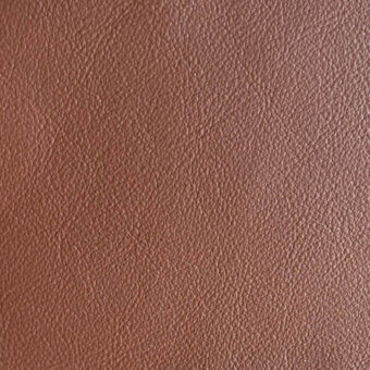 Brown leather texture displaying a dense, irregular grain pattern with warm tonal variations and a smooth, taut surface.
