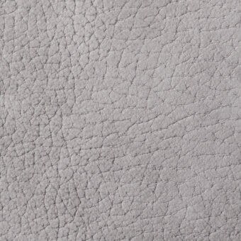 Light gray nubuck leather texture with a heavily pebbled surface, featuring fine lines and raised bumps in a matte finish.