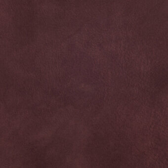 Natural velour fabric texture in muted burgundy, dense pile with mottled surface and matte finish, from the Cierre1972 collection.