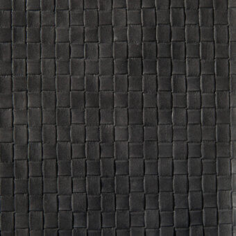 Dark gray leather texture with a dense, woven grid pattern and matte finish, displaying a consistent square motif and raised dimensional surface.