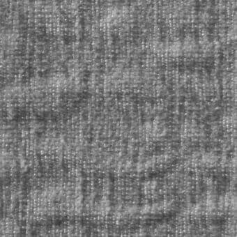 Gray woven fabric texture with irregular dot pattern, matte finish, and mottled shading creating a dense, uniform surface.