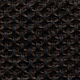Woven fabric texture, brown and charcoal gray, repeating hexagonal geometric pattern with dense interlocking weave, Constantini Pietro M65.