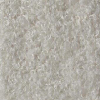 Off-white looped pile fabric texture, m85 Constantini Pietro collection, displays a uniform, dense curly surface with subtle tonal variations.