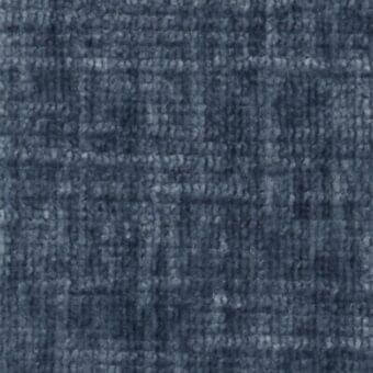 Woven fabric sample, blue-gray tone, subtle grid pattern with raised texture; “m93” from Constantini Pietro collection, matte finish.