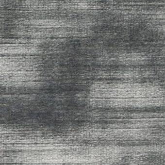 Gray striped textile sample with blurred horizontal bands, subtle texture, and a “costantini pietro” label visible in the lower right corner.