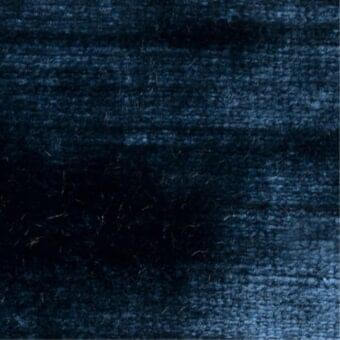 Blue fabric texture with linear pile, exhibiting a gradient from light to dark, dense weave, matte finish, studio sample, Constantini Pietro G71.