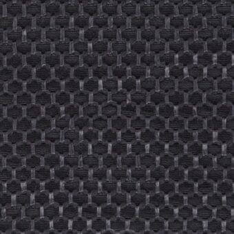 Geometric fabric texture in dark gray and charcoal tones features a repeating hexagon and rectangle pattern with a dense, structured weave.