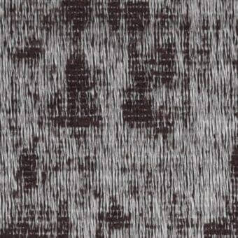 Dark brown and light gray fabric sample with a dense, vertical weave and slight slub texture; “costantini pietro” label visible.