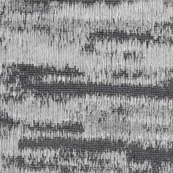 Woven grayscale fabric texture features irregular horizontal bands and dense vertical lines, creating a distressed, granular pattern.