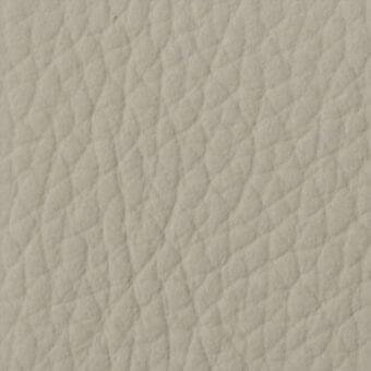 Beige pebbled leather texture with repeating bumps, matte finish, and subtle manufacturer’s mark “costantini pietro > leathers > 903”.