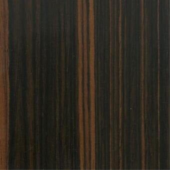 Dark ebony wood veneer with reddish-brown striations, displaying a linear grain pattern and glossy finish for furniture applications.