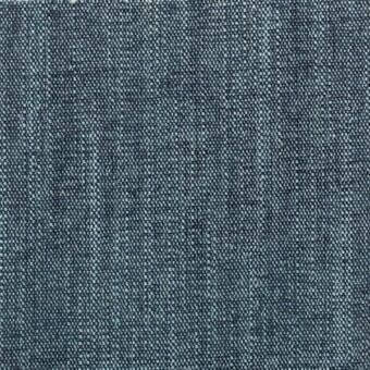 Dark teal woven fabric texture with heathered gray threads, dense grid pattern, matte finish, and “ditre italia” label visible.