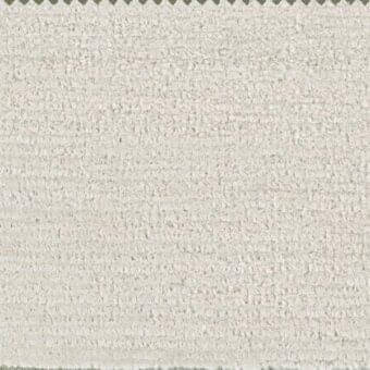 Off-white fabric swatch with dense, fibrous texture and scalloped green border, displaying tonal variations and a roughly trimmed edge.