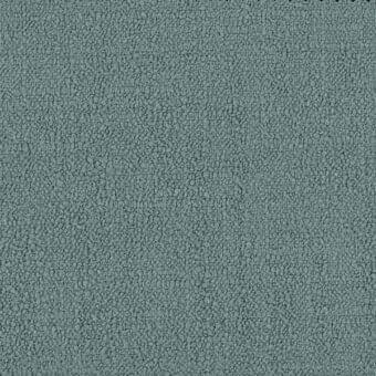Ditre Italia lounge fabric sample, gray-green textured weave, granular surface with mottled tone and dark top border.