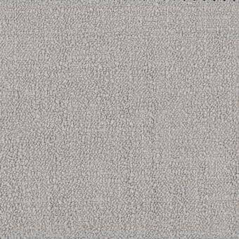 Ditre Italia fabric texture sample, muted gray, granular surface with speckled appearance and subtle printed text identification.