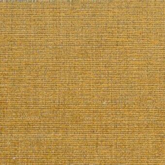 Mustard yellow woven fabric texture with linear pattern, dense matte finish, and raw fringe edge; ditre italia manhattan 017 textile sample.