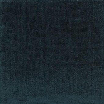 Ditre Italia Peggy 102 velvet fabric sample, deep teal color, dense plush pile with mottled surface and bound edges.