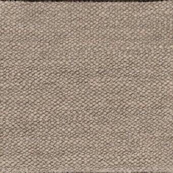 Beige-grey fabric texture with dense, nubby surface and circular nodes, displaying a consistent, repeating granular pattern and straight cut edges.