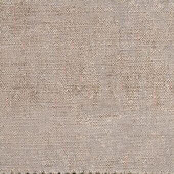 Ditre Italia fabric sample, beige-grey mottled texture, tightly woven with granular variation, from the “trend 001” collection.
