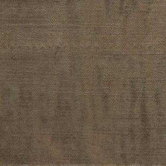 Textured fabric sample in brown and taupe tones features a dense weave and matte finish, labeled “ditre italia trend 039”.
