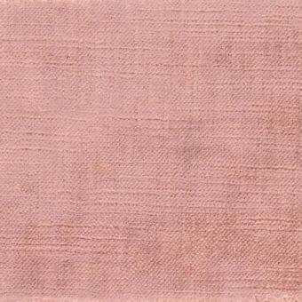 Dusty rose woven fabric texture with subtle horizontal striation and scattered reddish-brown flecks, matte finish, ditre italia label visible.