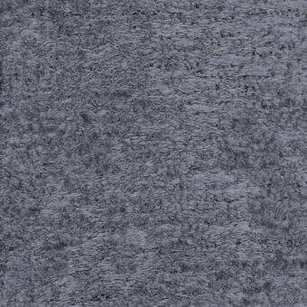Dark gray fabric texture, ditre italia uber 006, dense short fibers create a matte, plush pile with subtle tonal variations.