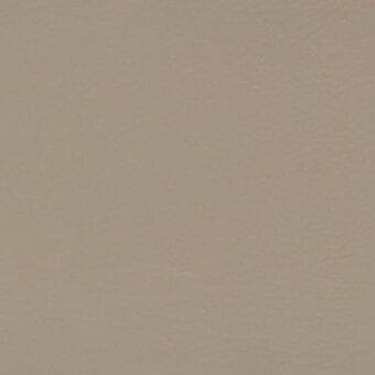 Leather surface in Luxor finish, muted taupe color, smooth matte texture, minimalist composition with brand text overlay.