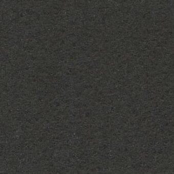 Leather upholstery sample, charcoal gray, dense granular texture with mottled effect and subtle tonal variations; Ditre Italia Vogue 404.