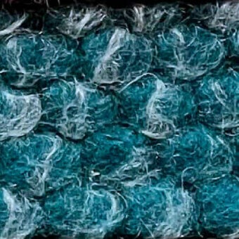 Teal fabric texture with interwoven white wisps, displaying a dense, organic pattern and indistinct facial shapes, labeled “egoitaliano puffo 803”.