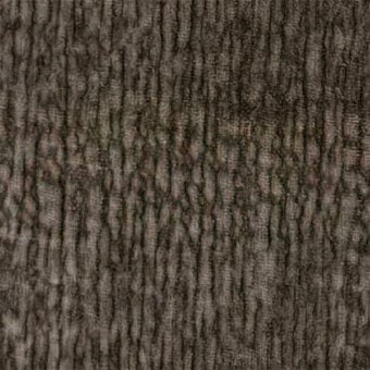 Ribbed fabric texture in muted gray-brown, featuring a repeating vertical pattern of raised ridges and shallow grooves with a matte finish.