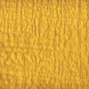 Mustard yellow egoitaliano snake fabric texture with dense looped fibers and vertical ribbing, displaying a matted, organic surface.