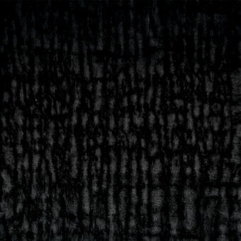 Charcoal gray fabric texture with a dense, vertical ridged pattern; uneven surface shows tonal variation and a repeating scale-like motif.