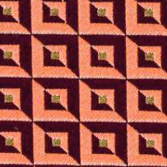 Burgundy and orange geometric fabric pattern with stepped squares, muted olive-green centers, and a digitally printed matte finish.
