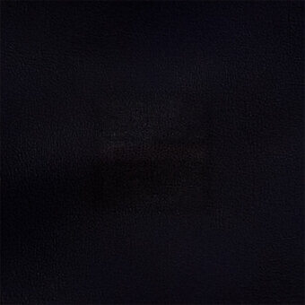 Black leather texture sample with granular matte finish, displaying natural hide grain and tonal variations; “egoitaliano” designation visible.