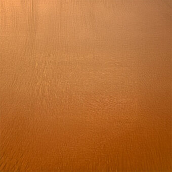 Orange leather texture sample displaying a matte, rippled surface with a gradient from dark to bright, labeled “egoitaliano > leather (b) > bull > 1506”.