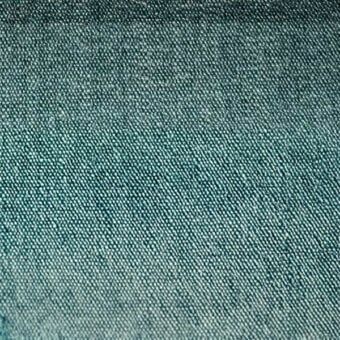 Microfiber fabric texture, teal green, directional weave with gradient; “egoitaliano > microfibra > apollo > 803” text visible.