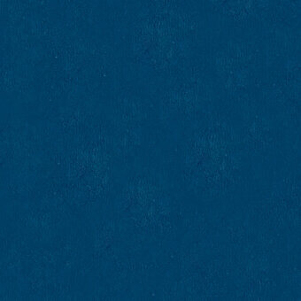 Ottanio 26 microfibra cashmere textile displays a deep teal-blue, granular texture with a matte, mottled finish and subtle tonal variations.