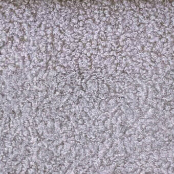 Microfiber fabric texture, muted gray color, dense looped pile with spiraling fibers and subtle undulating pattern.