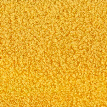 Microfiber fabric texture in mustard yellow, featuring a dense looped pile and granular appearance with subtle tonal variations.