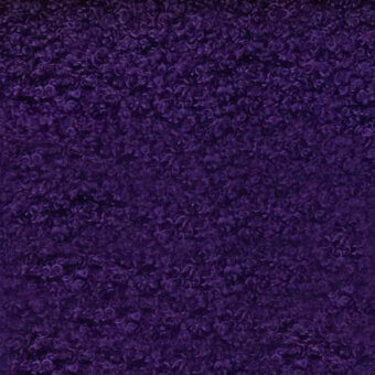 Purple microfibra fabric texture with repeating floral pattern, “egoitaliano naixe 23” label, crushed velvet pile, shadowed surface.