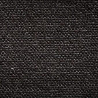 Dark gray lino fabric texture, stone-washed finish, dense nubby weave with tonal variations and a uniform, flat surface.